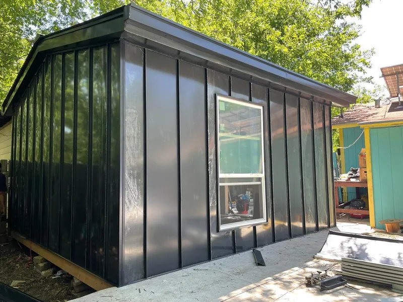 Black standing seam metal wall panels for Metal Roof Installation in Prunedale