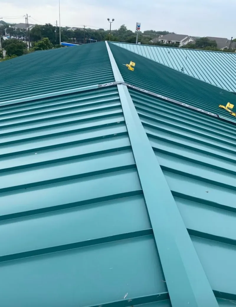 Green commercial metal roof ridge and valley for Metal Roof Repair in Prunedale